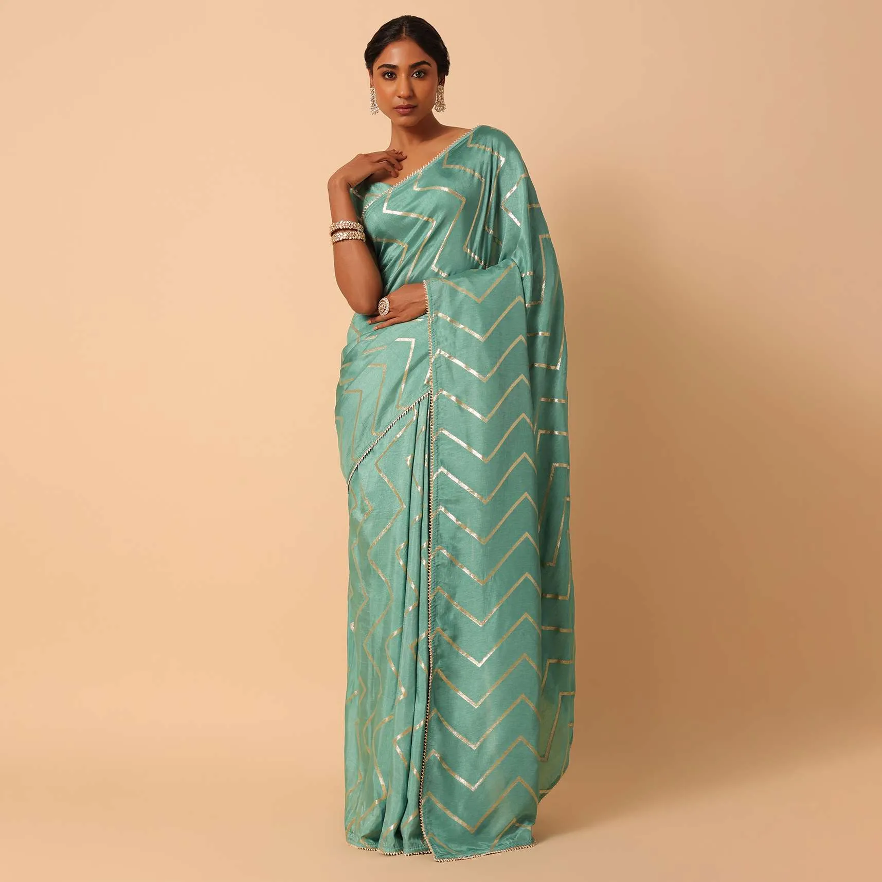 Green Dola Silk Saree With Zig Zag Lurex Work And Unstitched Blouse Piece