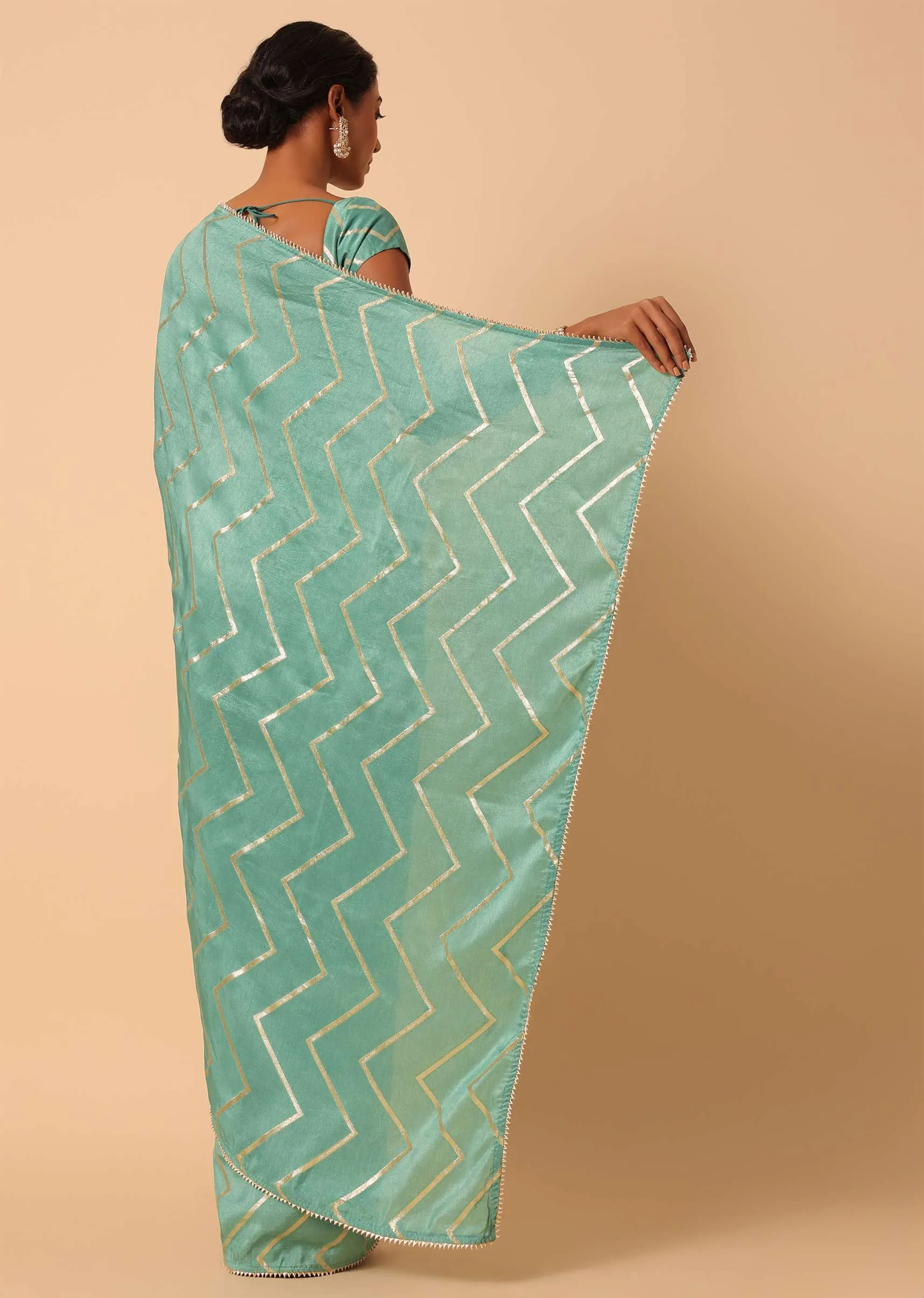 Green Dola Silk Saree With Zig Zag Lurex Work And Unstitched Blouse Piece