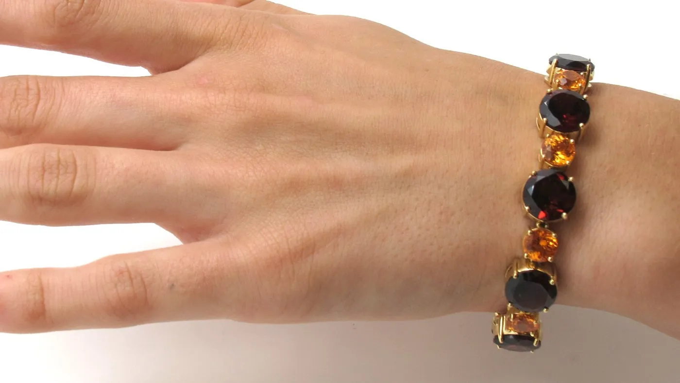 Spessartite and Red Garnet Tennis Bracelet, 54.87 Carats Total in 18K Yellow Gold